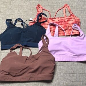 Lot of 4 Athleta sport bras. All size M